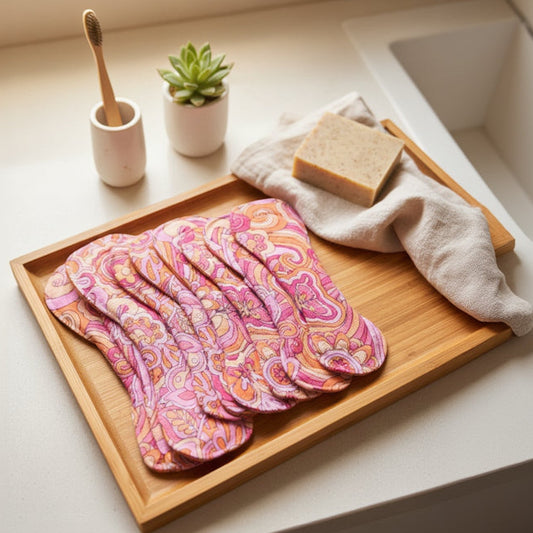 Set of colorful patterned coasters on a brown surface